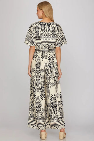 HALF SLEEVE WOVEN PRINT JUMPSUIT WITH ELASTIC WAISTBAND AND POCKETS