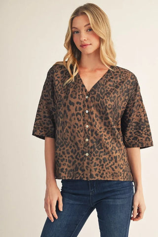Drop shoulder button down metallic leopard top.