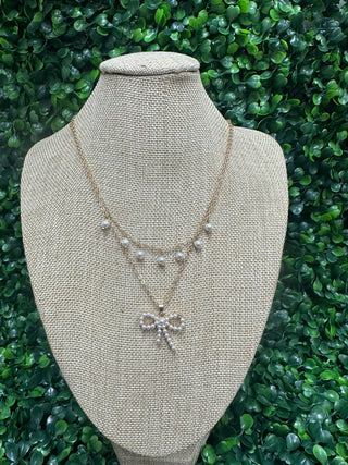 GOLD LAYERED PEARL BOW PENDANT NECKLACE