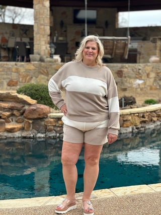 beige knit strip shorts with a drawstring 