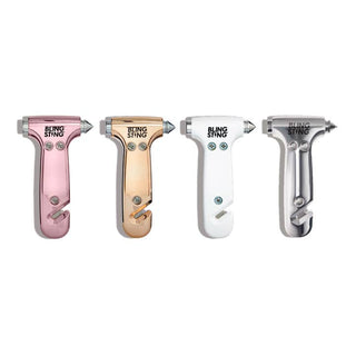 Four car window breakers in different colors on a white background