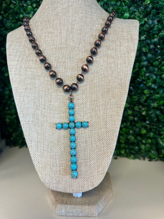 Long Beaded Necklace Accented with a Turquoise Cross