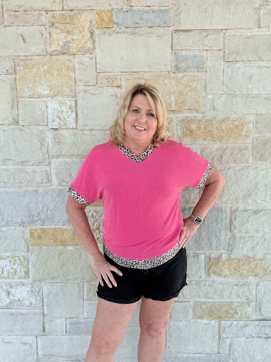 pink top with leopard print trim 