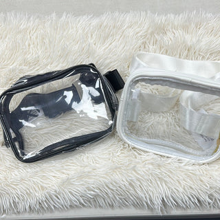 Two clear plastic bags on a white fluffy surface